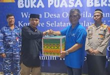 Photo of PT Anindya Wiraputra Konsult Bagikan Ratusan Paket Lebaran ke Warga Desa Onewila