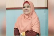 ERNAWATI, AMKL,.S.KM