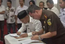 Kajari Buton dan Pemdes Teken Perjanjian Kerja Sama Pendampingan Hukum