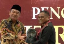 Tingkatkan Perlindungan Tenaga Kerja, Muna Barat Raih Paritrana Award 2024