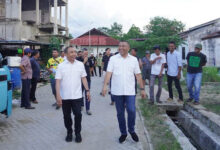 AJP-ASLI Blusukan di Kecamatan Baruga, Janji Muluskan Jalan hingga Permudah Pelaku UMKM