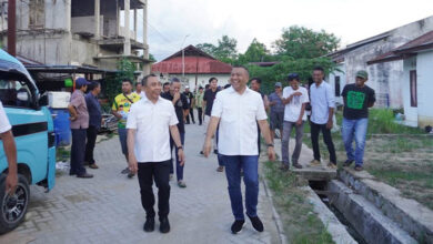 AJP-ASLI Blusukan di Kecamatan Baruga, Janji Muluskan Jalan hingga Permudah Pelaku UMKM